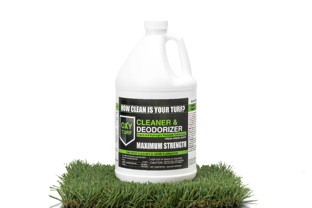 OxyTurf turf cleaner & deodorizer one-gallon jug on synthetic grass